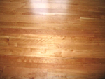 this brilliant finish really shows the depth of color in this williamsburg style floor.